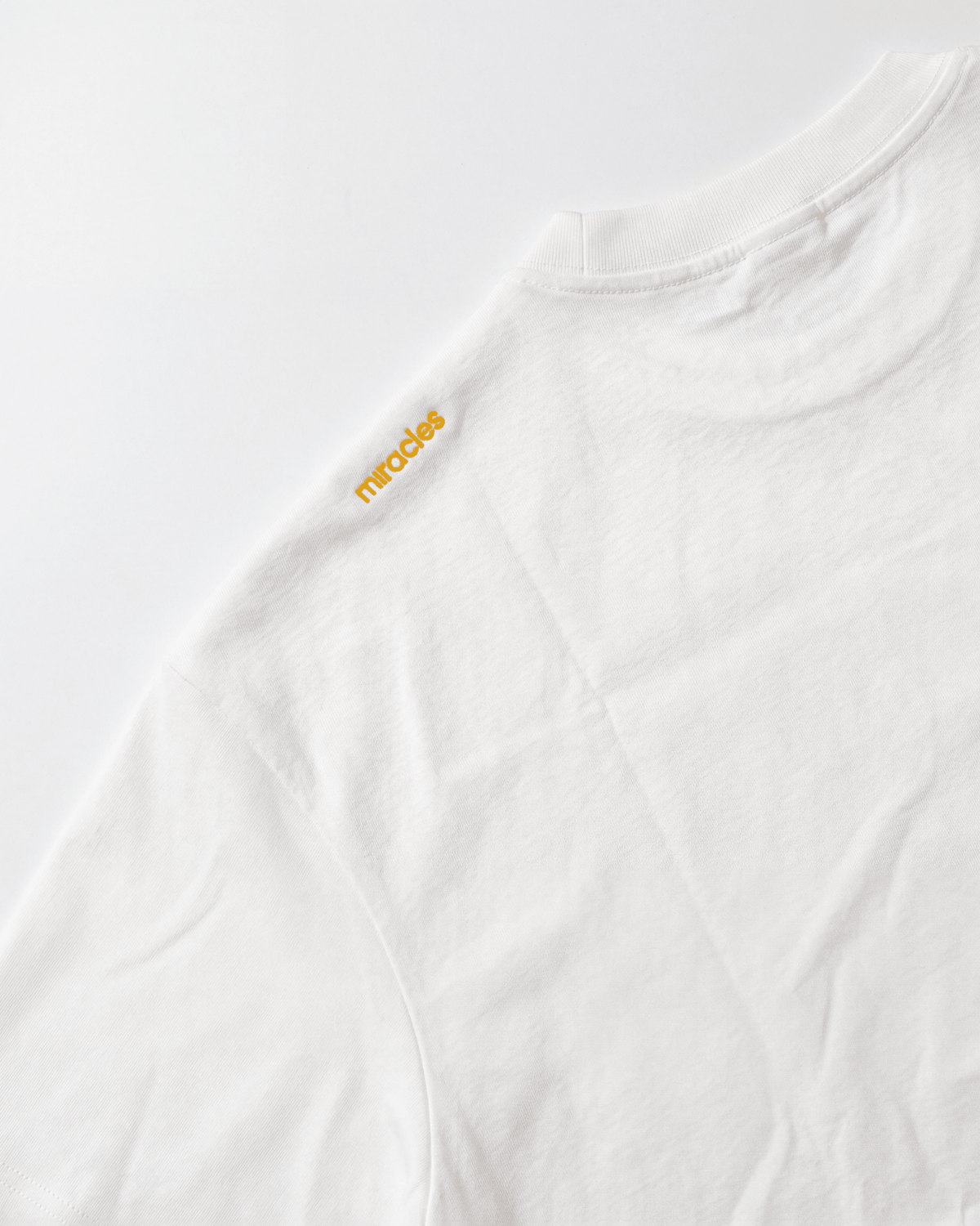 Deemples × Miracles Golf — Oversized Varsity Tee - Miracles Golf