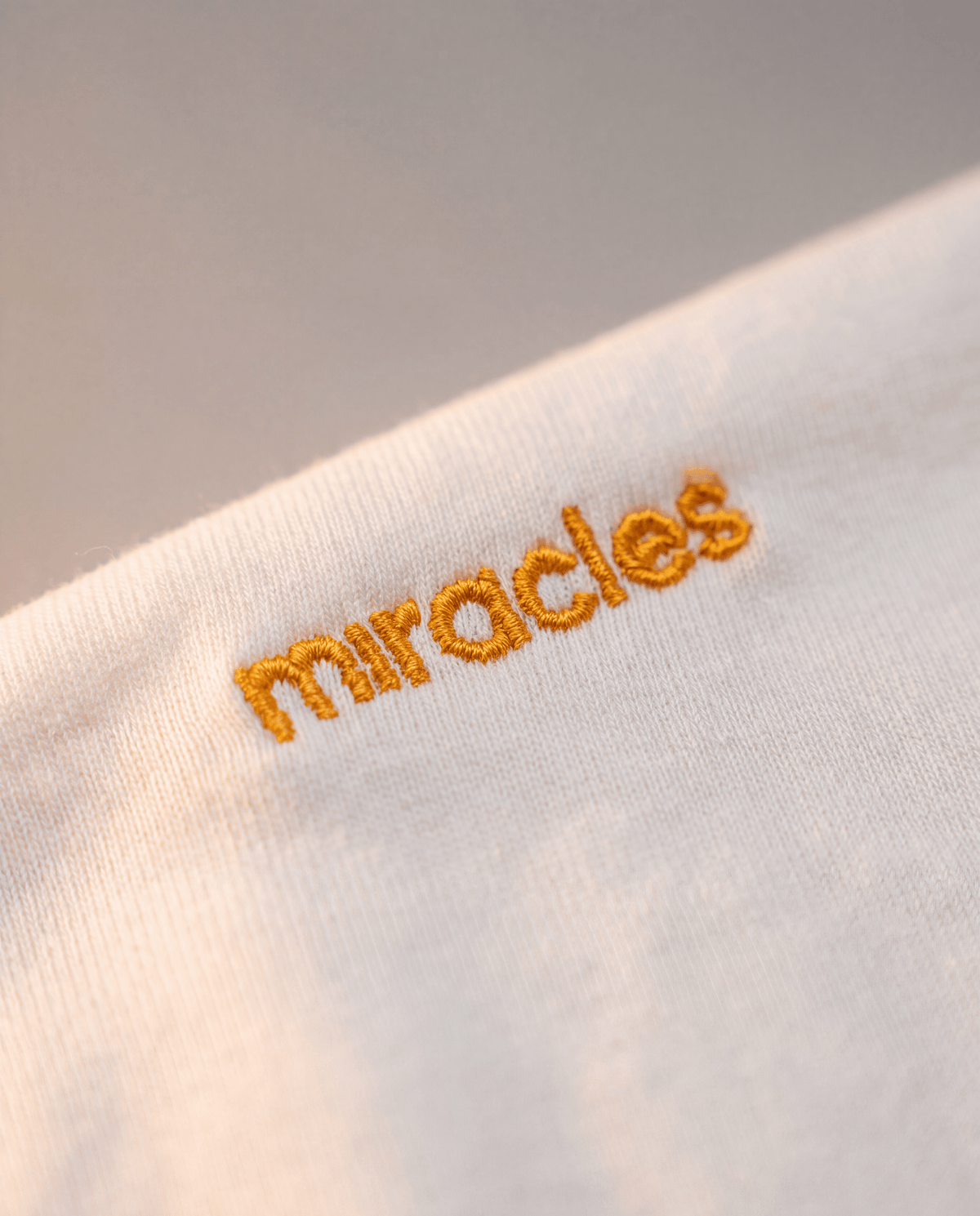 Deemples × Miracles Golf — Oversized Varsity Tee - Miracles Golf