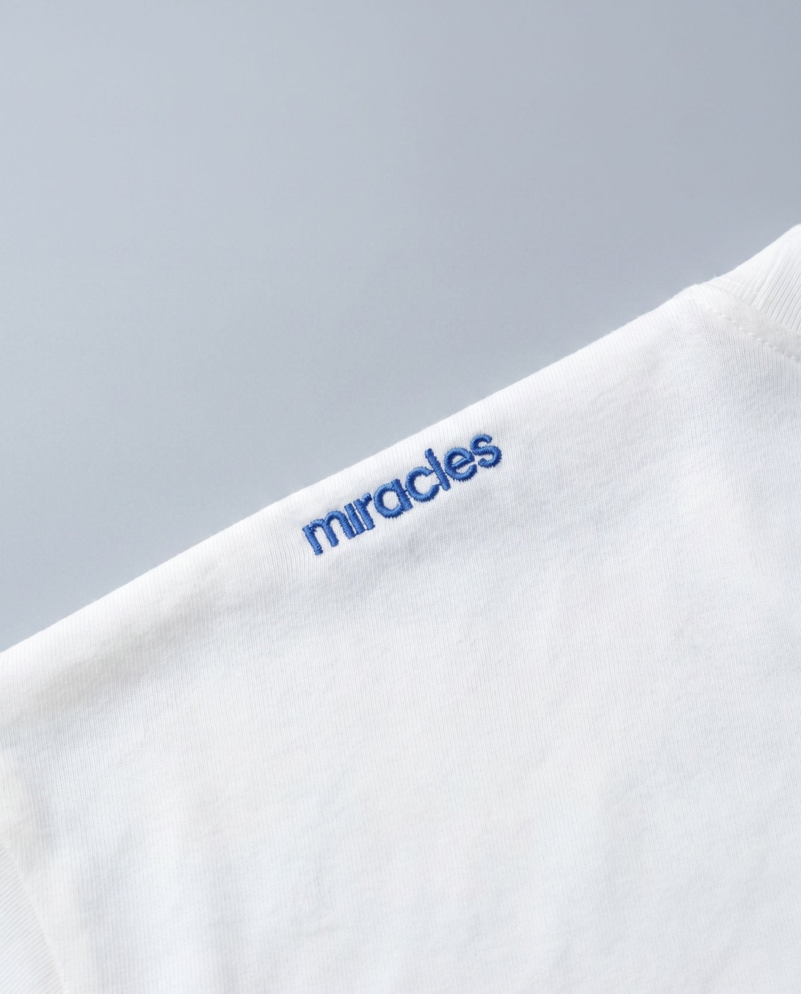 Varsity Oversized T-Shirt (White / Blue) - Miracles Golf